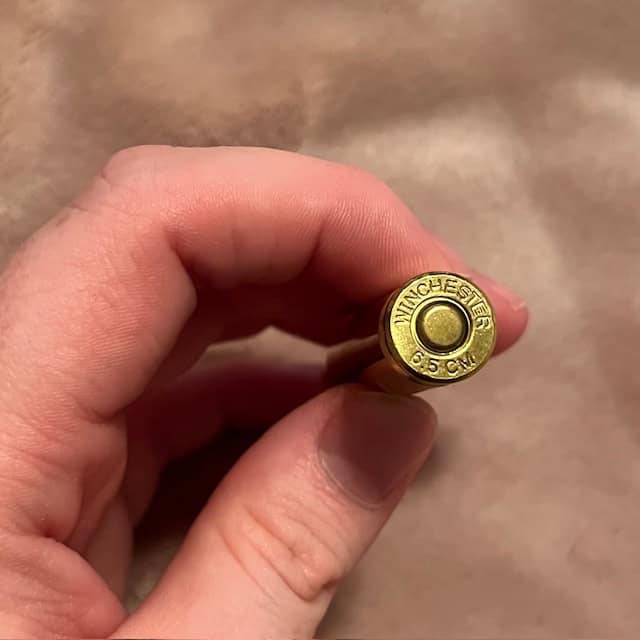 The head stamp of a 6.5 Creedmoor cartridge.