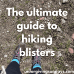 a picture of someones feet with their hiking boots on. the words "the ultimate guide to hiking blisters" is overlain on the image