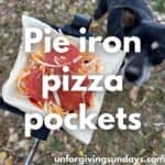 This is the title image. An open pie iron with crust, sauce, cheese and pepperoni layered on one side. A dog is spying in the background.