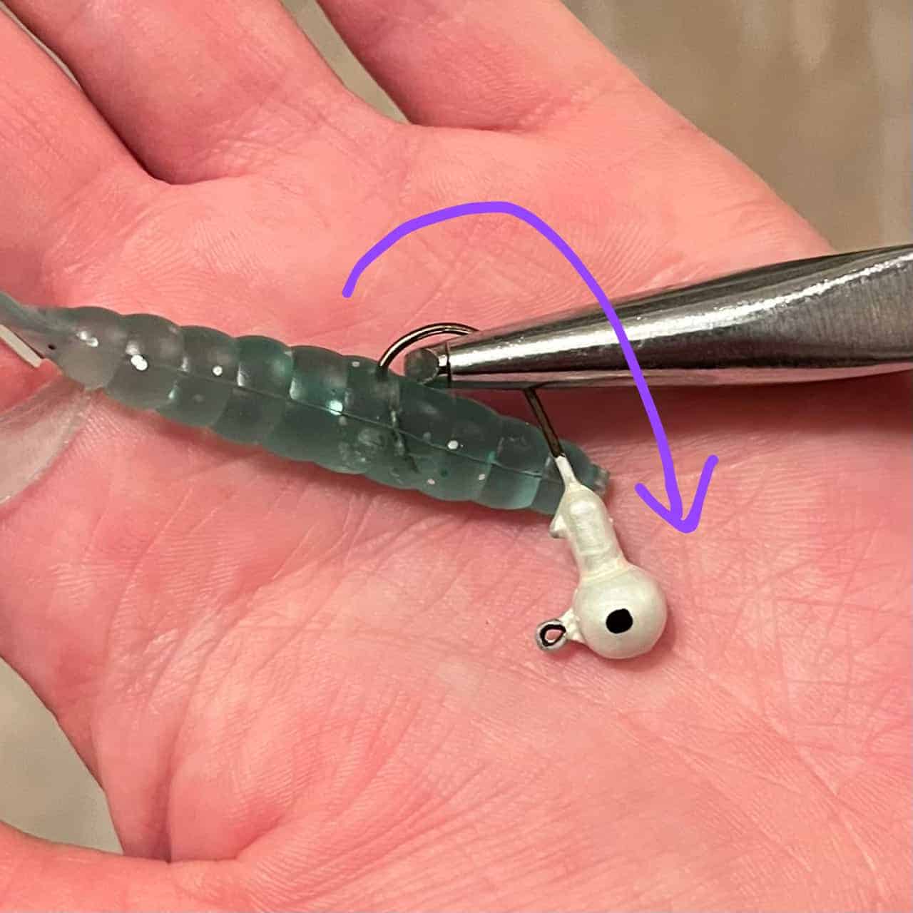 A pair of needle-nosed pliers demonstrating how to remove a fishing hook.